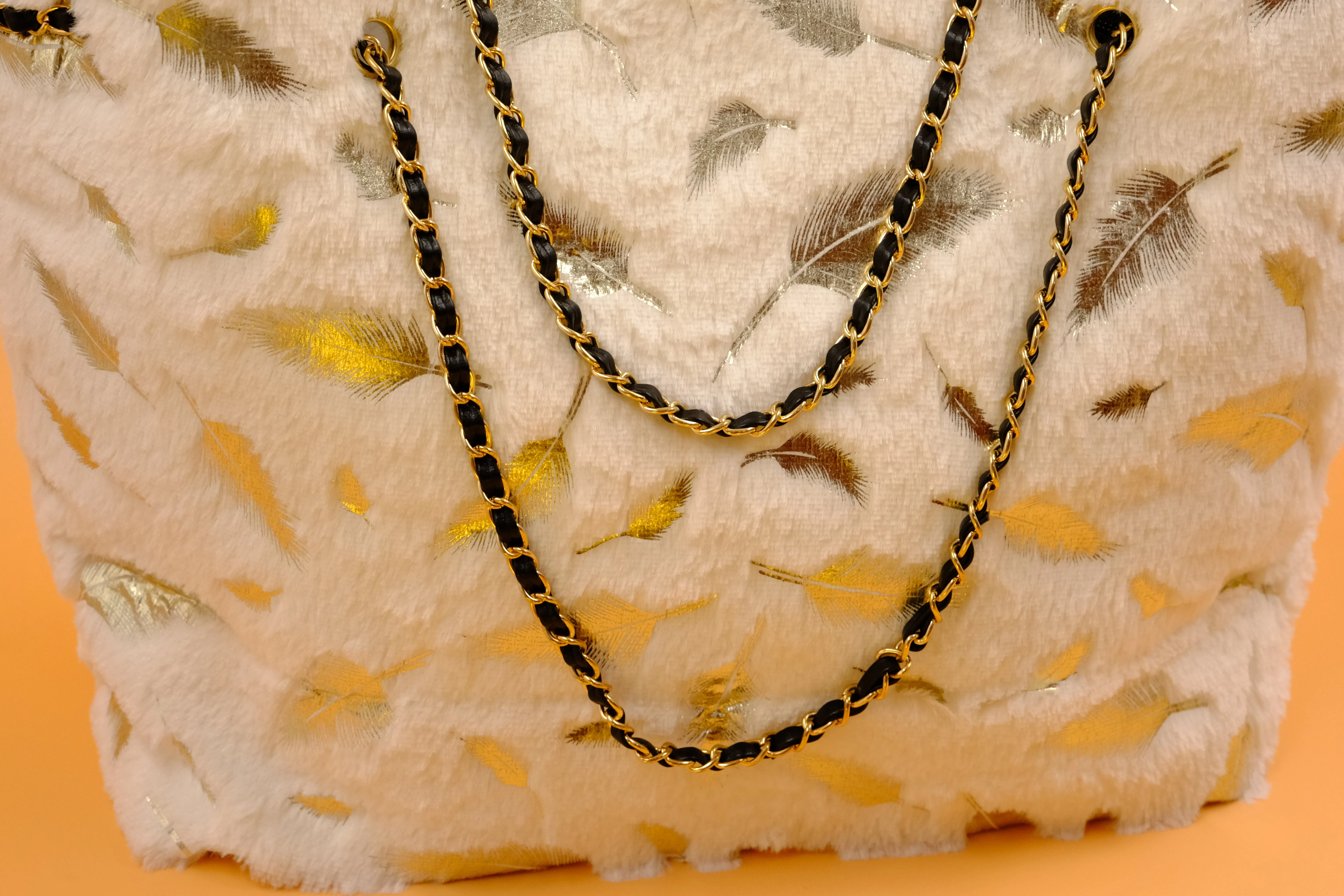 Elegant Black Faux Fur Tote Bag with Gold Feather Accents