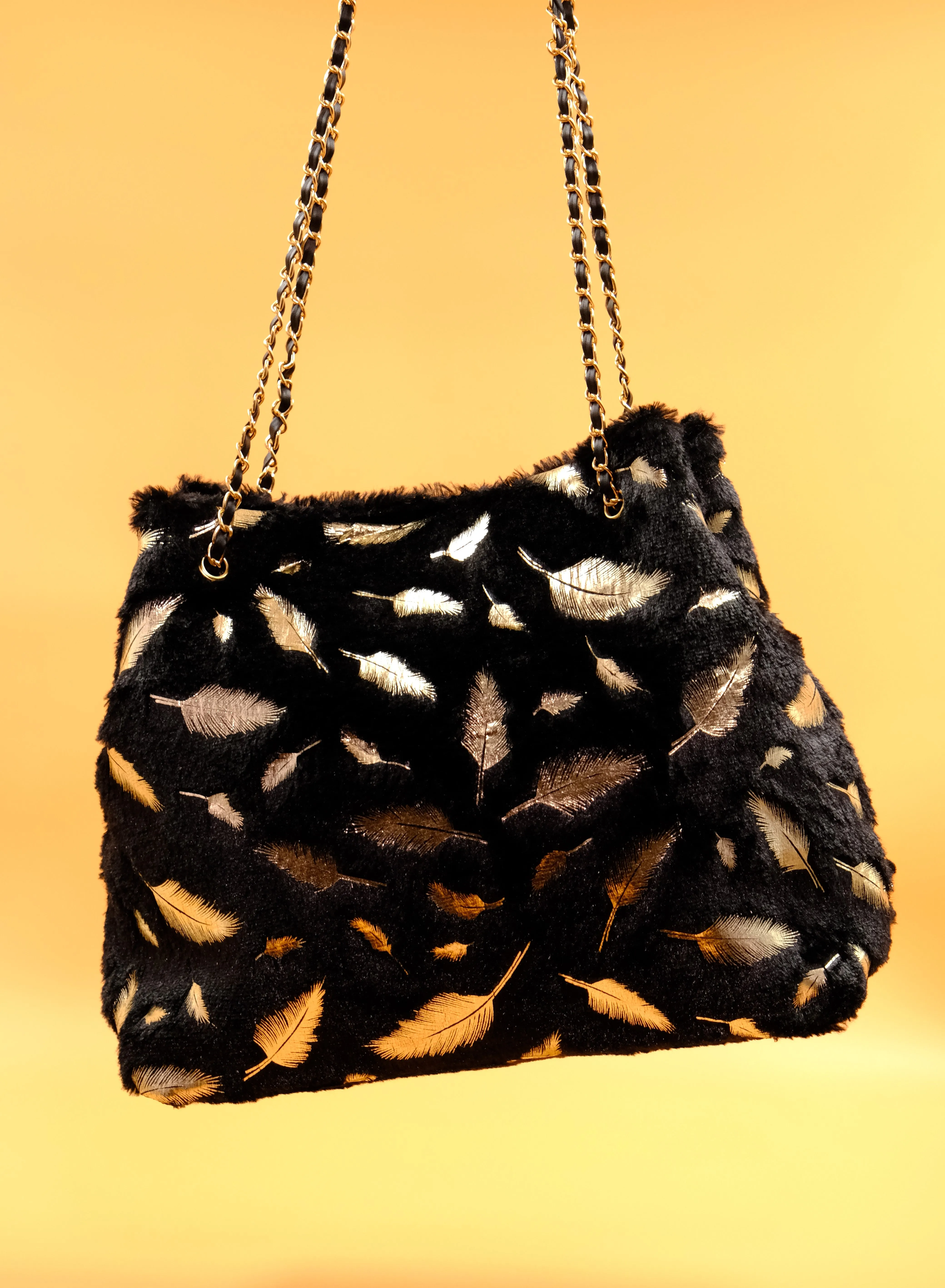 Elegant Black Faux Fur Tote Bag with Gold Feather Accents