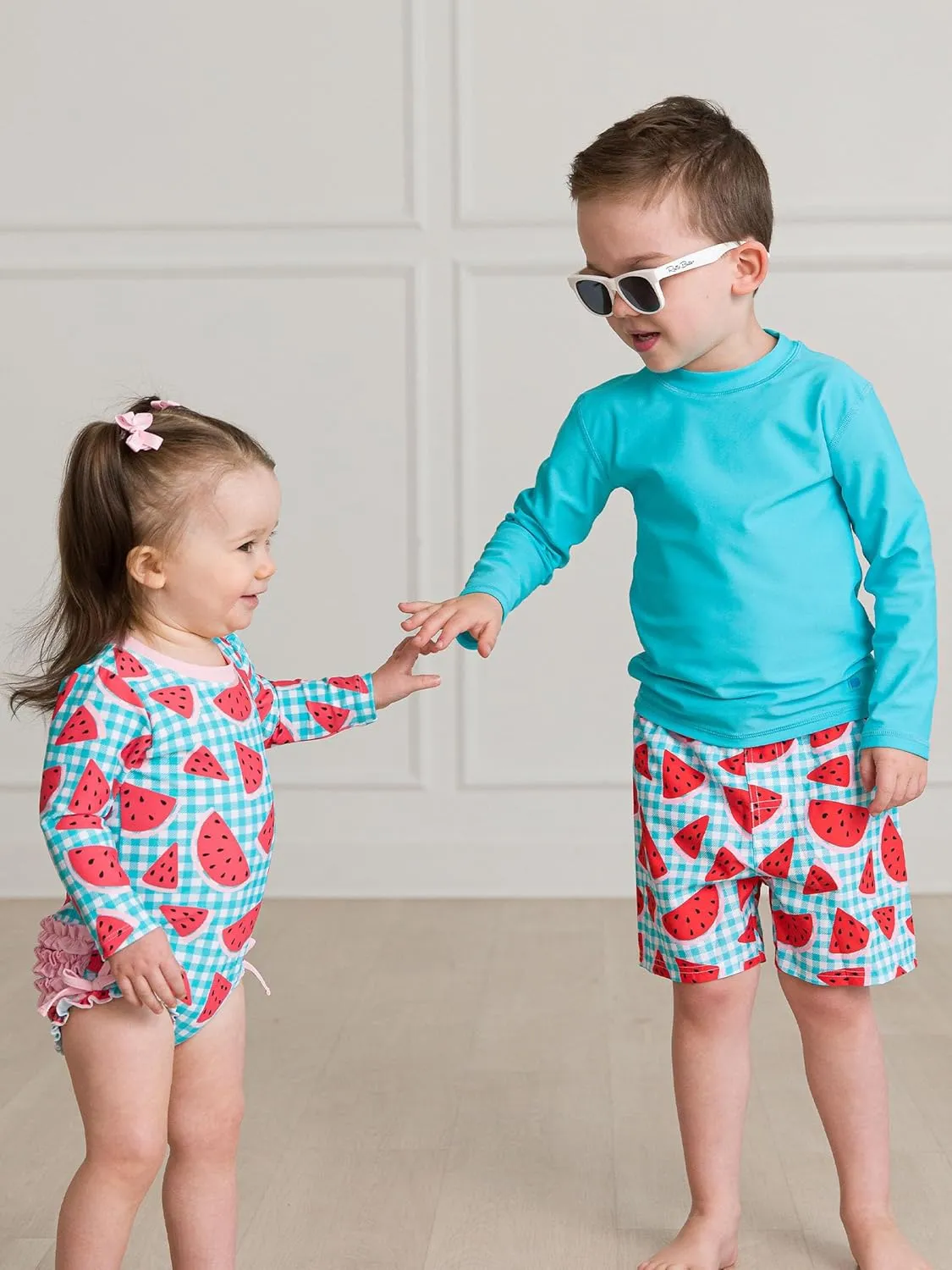 RuffleButts Baby Girls UPF 50  Sun Protection Gingham Printed Long Sleeve One Piece Rash Guard Swimsuit with Zipper