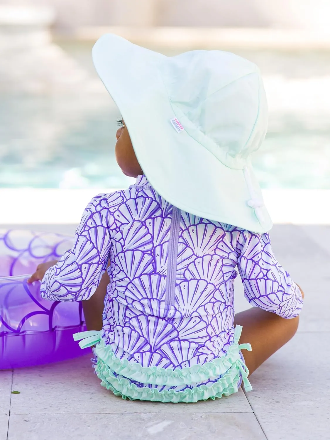 RuffleButts Baby Girls UPF 50  Sun Protection Novelty Print Long Sleeve One Piece Rash Guard Swimsuit with Zipper