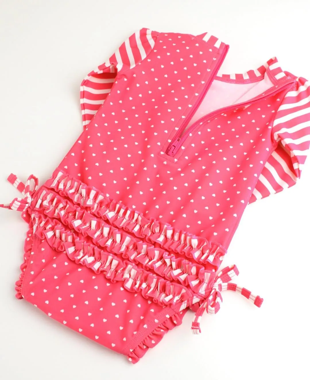 RuffleButts Baby Girls UPF 50  Sun Protection Polka Dot Long Sleeve One Piece Rash Guard Swimsuit with Zipper