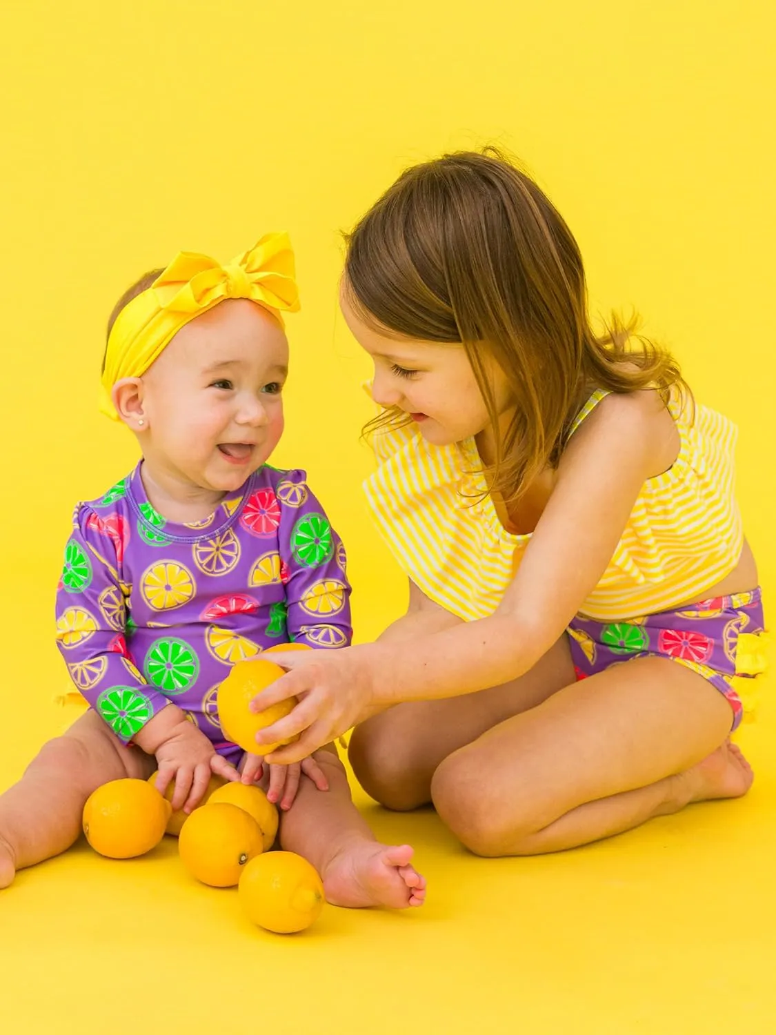 RuffleButts Baby Girls UPF 50  Sun Protection Tropical Print Long Sleeve One Piece Rash Guard Swimsuit with Zipper